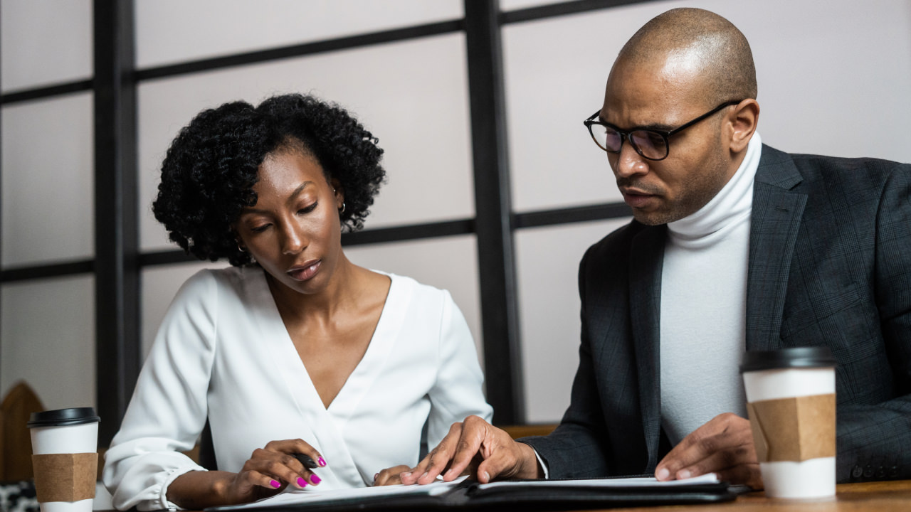 two people working