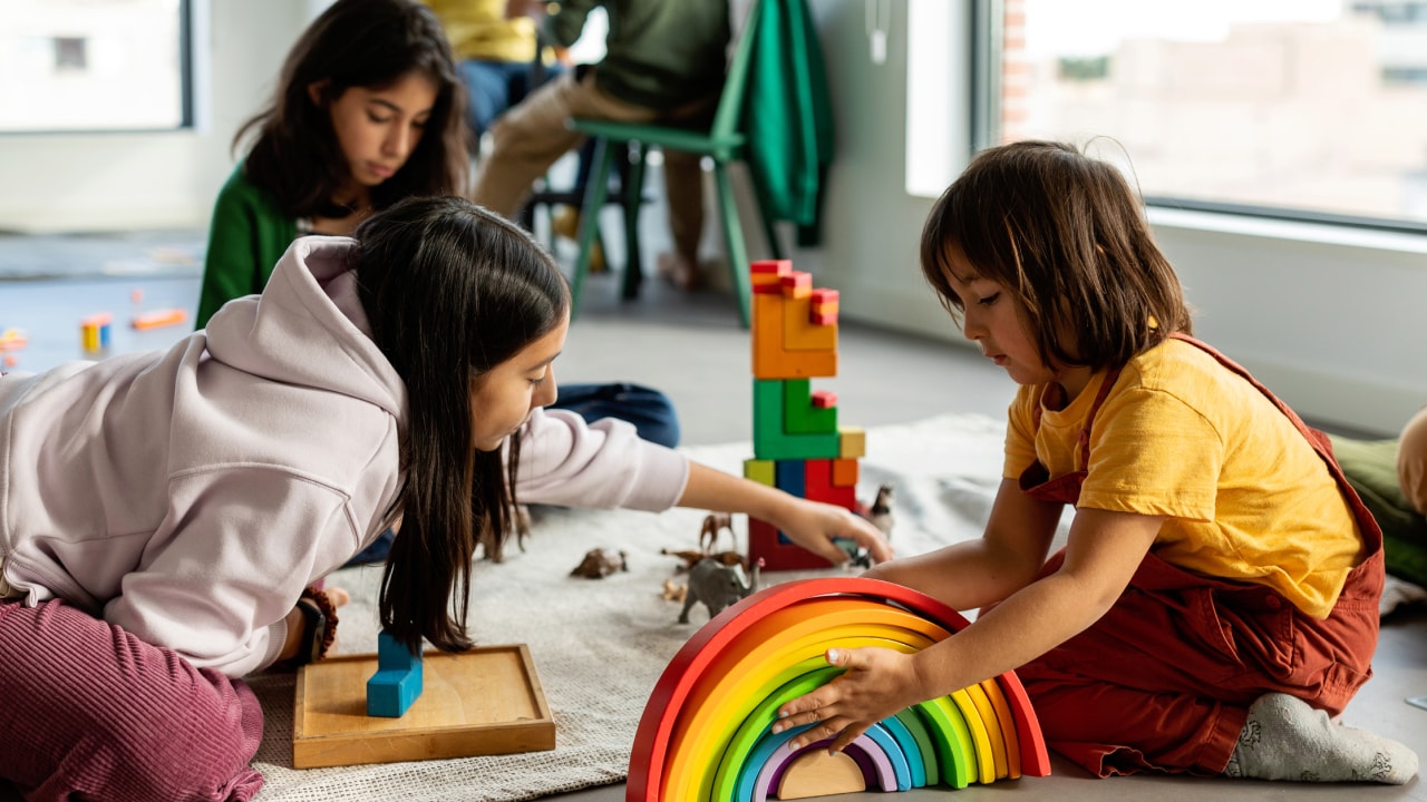Kids playing together on the floor