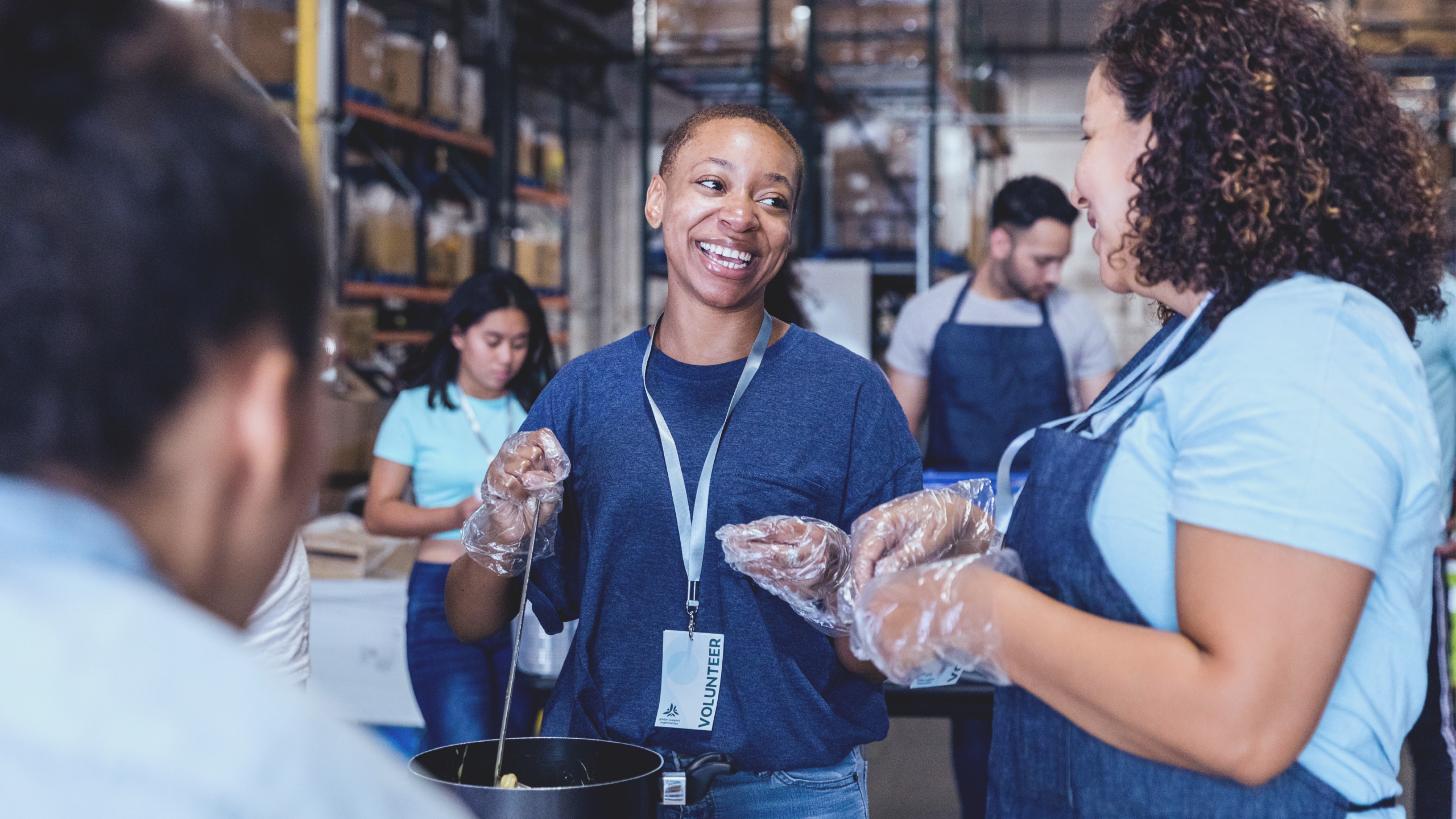 Volunteer in soup kitchen.